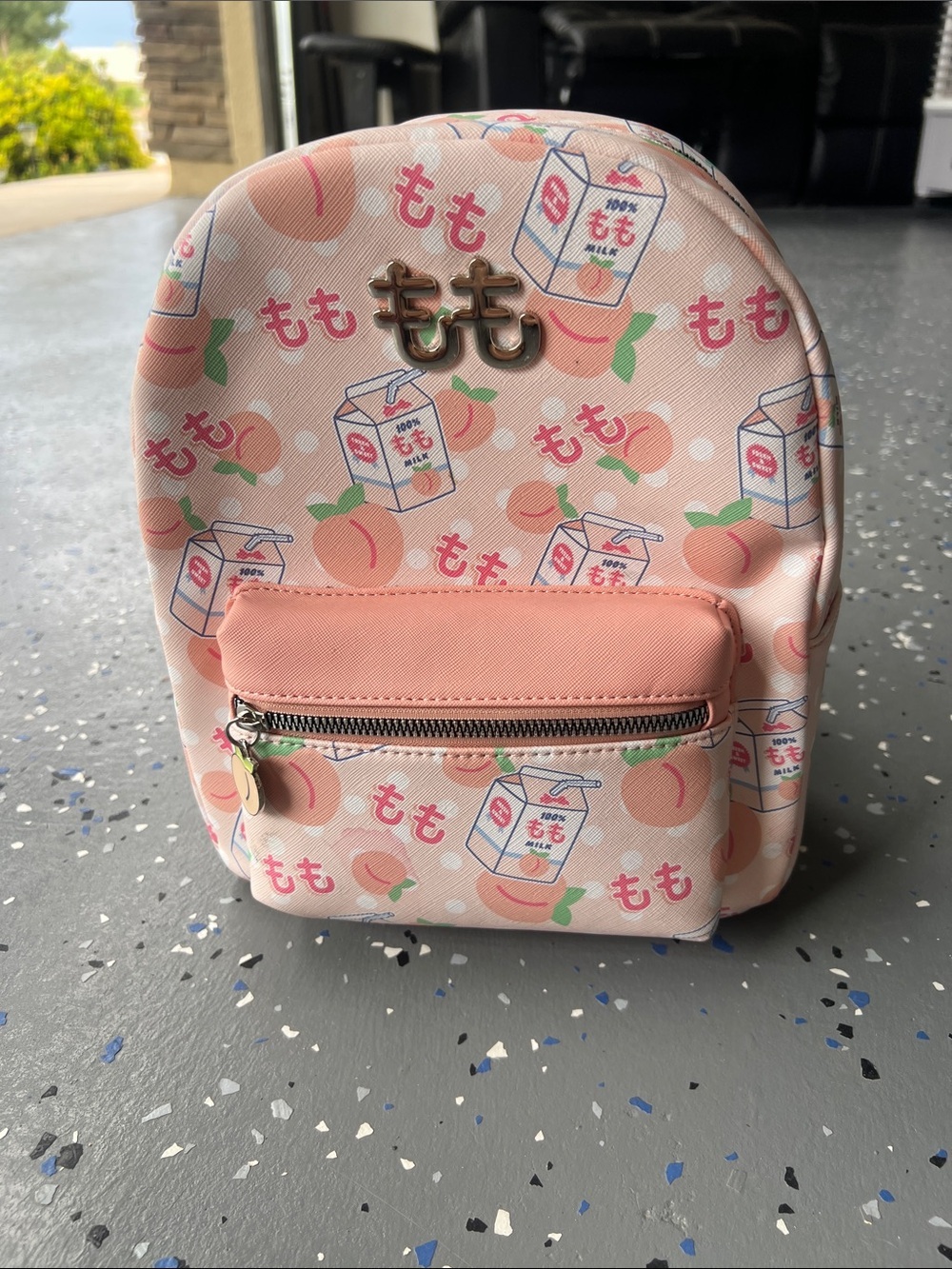 Synthetic mini backpack, BioWorld Pastel Peach Milk design